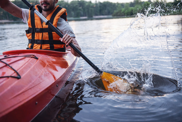 man and kayak